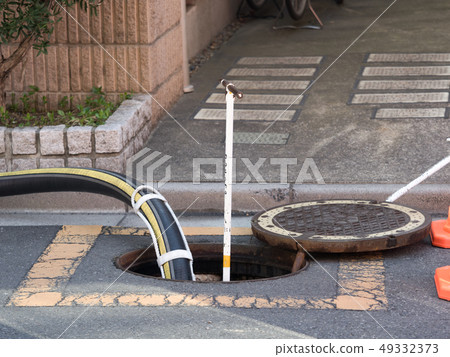 Fire hydrant connected with fire hose Fire hydrant connected with fire hose 49332373