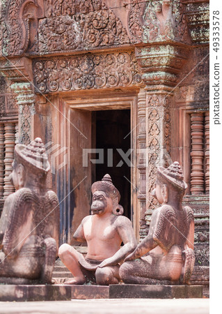 Ancient pink stone guardian statue carvings in Ancient pink stone guardian statue carvings in 49333578