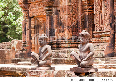 Ancient pink stone guardian statue carvings in Ancient pink stone guardian statue carvings in 49333580