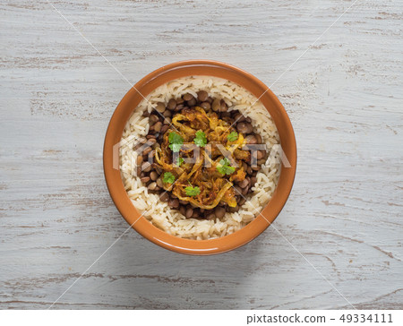 Mujadarra - Arabian dish with rice and lentils. Mujadarra - Arabian dish with rice and lentils. 49334111