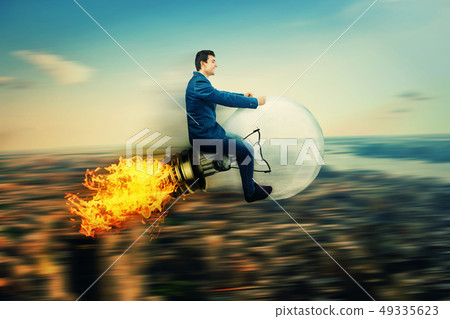 rocket bulb over city rocket bulb over city 49335623