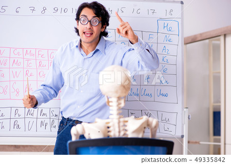 Young male chemist teacher and student skeleton Young male chemist teacher and student skeleton 49335842