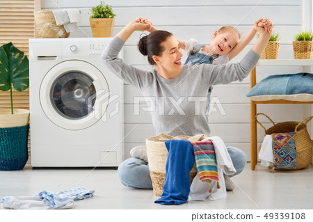 family doing laundry 49339108