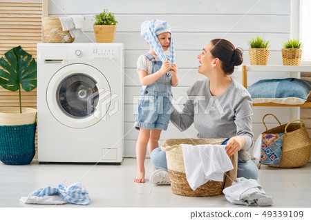 family doing laundry family doing laundry 49339109
