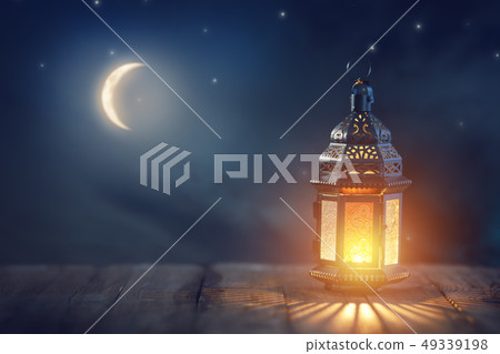 Arabic lantern with burning candle 49339198