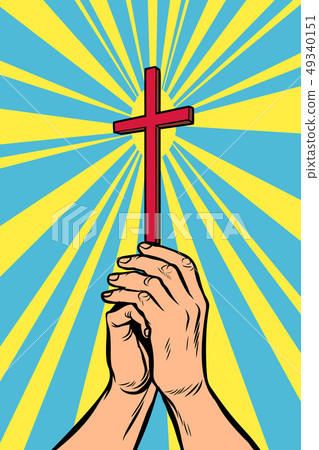 Christian cross in the light, hands of the believer 49340151