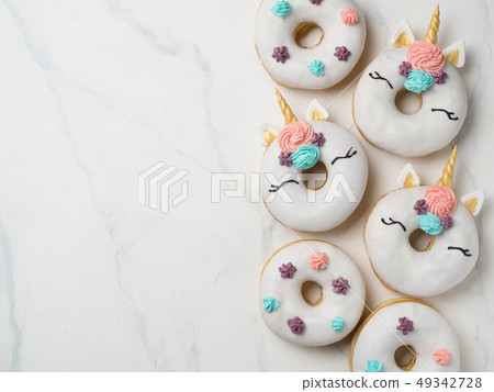 Unicorn donuts with copy space Unicorn donuts with copy space 49342728