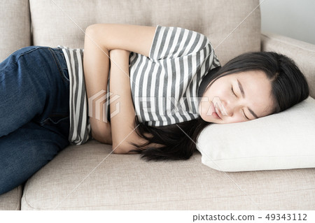 Young asian woman sit on sofa in the living room 49343112