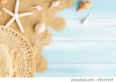 Top view of sea straw hat and sea shells Top view of sea straw hat and sea shells 49343504