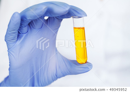 Medicine. Lab Technician Doing Chemistry Experiment. Close Up Of Scientist Checking Test Tube In Medicine. Lab Technician Doing Chemistry Experiment. Close Up Of Scientist Checking Test Tube In 49345952