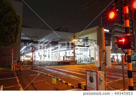 Railroad crossing at Higashifuchu Station at night Railroad crossing at Higashifuchu Station at night 49345953