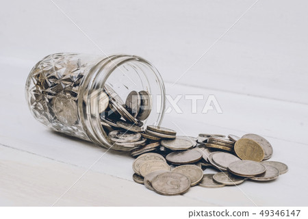 A stack of coins on the background. A stack of coins on the background. 49346147