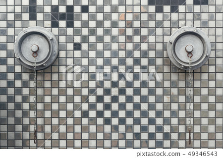 fire hydrants on the wall with mirrored mosaics day 49346543