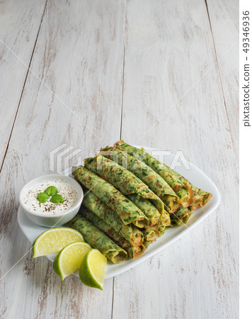 Pancake green rolls. Gluten free spinach pancakes. 49346936