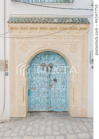 Traditional old painted door in a historical Traditional old painted door in a historical 49347758