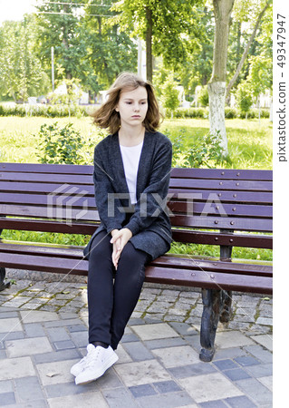 Beautiful blond girl fourteen years old Beautiful blond girl fourteen years old 49347947