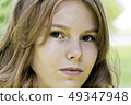 Beautiful blond girl fourteen years old 49347948