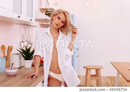 Girlfriend showing her body and abs in unbuttoned shirt Girlfriend showing her body and abs in unbuttoned shirt 49348734