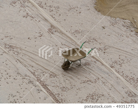 one empty wheelbarrow one empty wheelbarrow 49351775