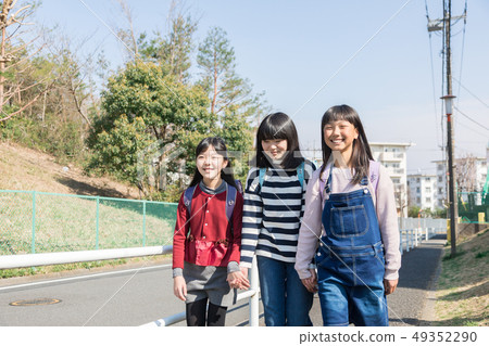 Elementary school student returning to school Elementary school student returning to school 49352290