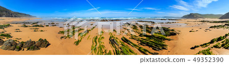 Rock formations on sandy beach (Portugal). Rock formations on sandy beach (Portugal). 49352390