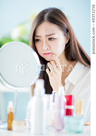 woman with acne problem woman with acne problem 49353256
