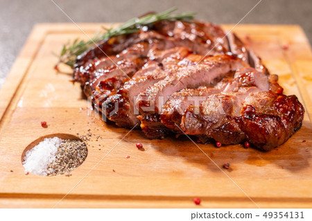 Food, delicious, horse meat and craft concept - serving of grilled steak 49354131