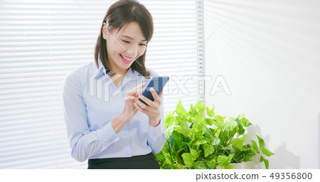 business woman use smart phone 49356800