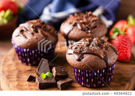 Tasty chocolate muffins 49364922