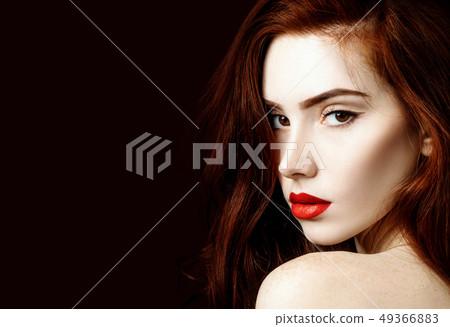 Beauty portrait of redhead woman with perfect skin. 49366883