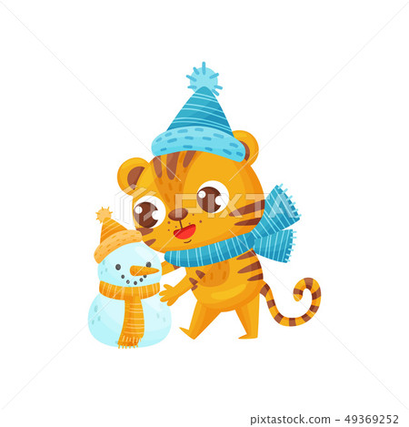 Happy tiger sculpts snowman on white background. Happy tiger sculpts snowman on white background. 49369252