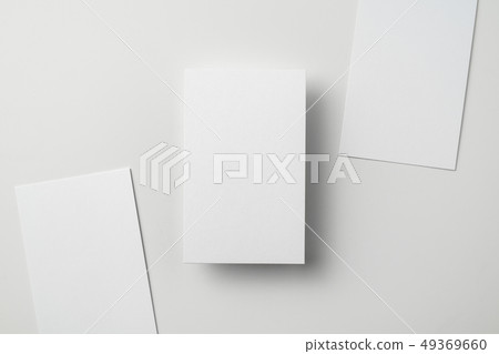 top view of 3 business card isolated on white 49369660