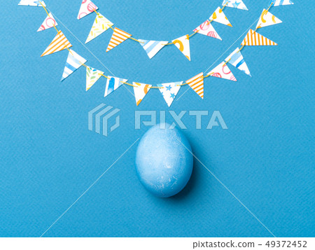 Easter egg and DIY paper garland. 49372452