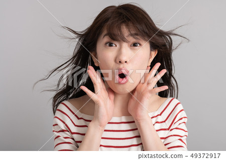 Surprised look young woman surprised shock shock Surprised look young woman surprised shock shock 49372917