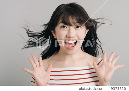 Surprised look young woman shock surprised 49373830