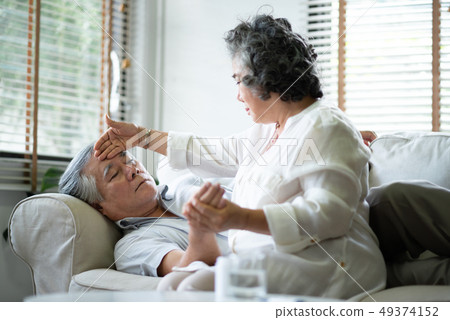 Asian Senior Woman is taking care her husband at Asian Senior Woman is taking care her husband at 49374152