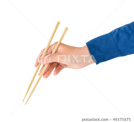 Hand with chopsticks 49375875