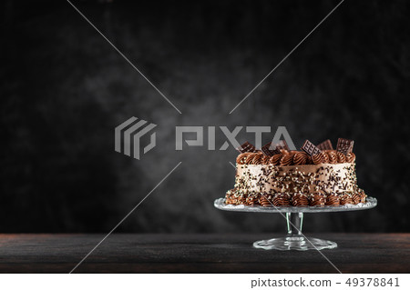Chocolate cake on dark background 49378841