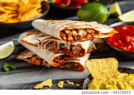 Chicken quesadillas with paprika and cheese 49378853