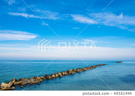 Baltic Sea coast with blue sky in Wustrow, Germany 49381494