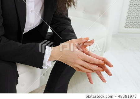 businesswoman nervously moving hands before meetting with psychologist in office 49381973