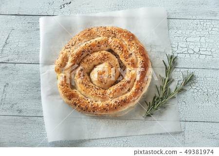 Spiral phyllo pie with feta Spiral phyllo pie with feta 49381974