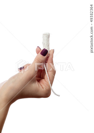 tampon in hand 49382364