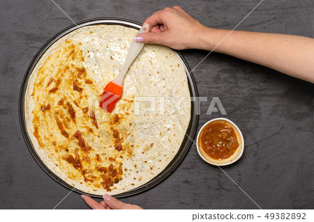 Recipe of pizza capriciosa on grey stone Recipe of pizza capriciosa on grey stone 49382892