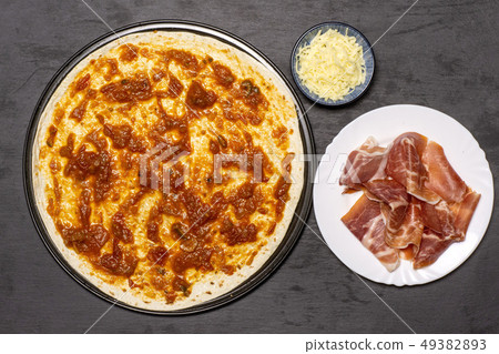 Recipe of pizza capriciosa on grey stone Recipe of pizza capriciosa on grey stone 49382893