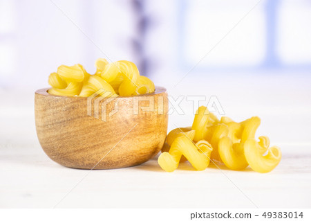 Cavatappi pasta raw with blue window Cavatappi pasta raw with blue window 49383014