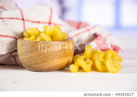 Cavatappi pasta raw with blue window Cavatappi pasta raw with blue window 49383027