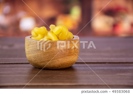 Cavatappi pasta raw with rustic kitchen Cavatappi pasta raw with rustic kitchen 49383068