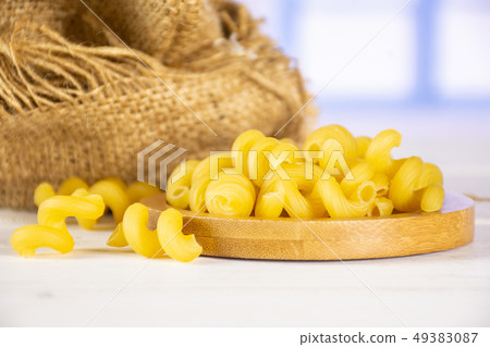 Cavatappi pasta raw with blue window 49383087