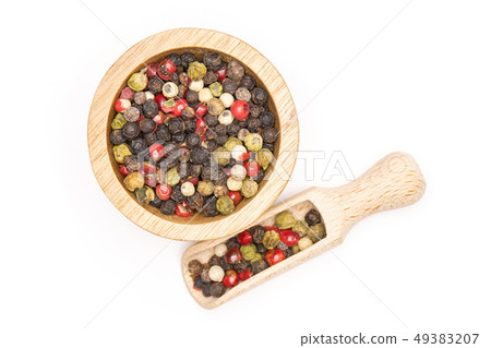 Four colors of peppercorns isolated on white Four colors of peppercorns isolated on white 49383207